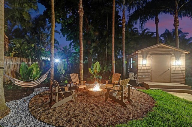16301 SW 62nd St, Southwest Ranches, FL 33331 - view of patio / terrace featuring an outdoor fire pit