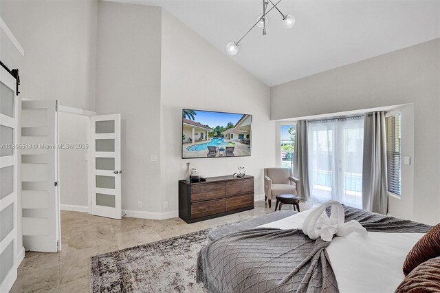 16301 SW 62nd St, Southwest Ranches, FL 33331 - bedroom featuring high vaulted ceiling, a barn door, access to outside, and baseboards
