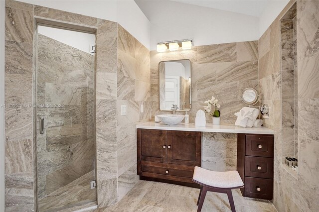 16301 SW 62nd St, Southwest Ranches, FL 33331 - full bath featuring tile walls, a shower stall, vanity, lofted ceiling, and marble finish flooring