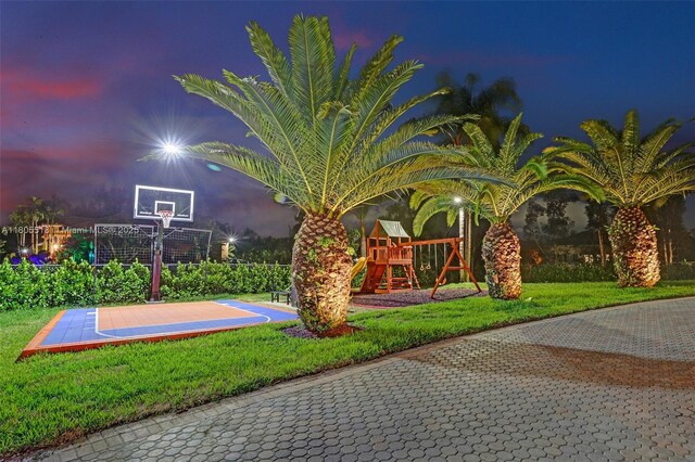 16301 SW 62nd St, Southwest Ranches, FL 33331 - view of sport court with a playground, basketball hoop, and a yard