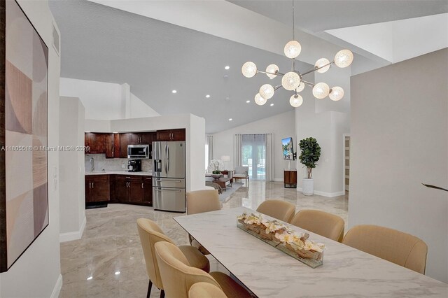 16301 SW 62nd St, Southwest Ranches, FL 33331 - dining room featuring light marble finish flooring, high vaulted ceiling, recessed lighting, a chandelier, and baseboards