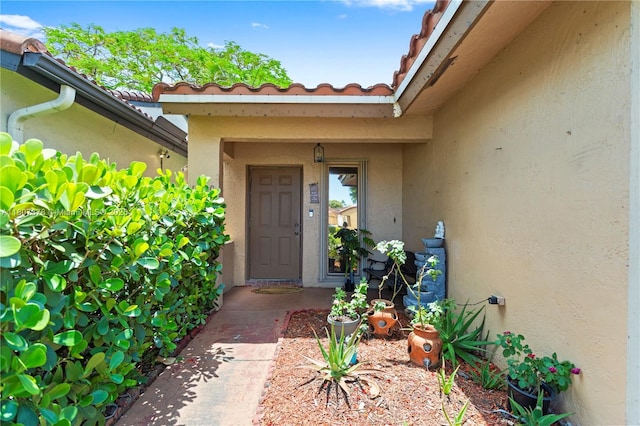17320 NW 66th Pl, Hialeah, FL 33015 - property entrance with stucco siding and a tiled roof
