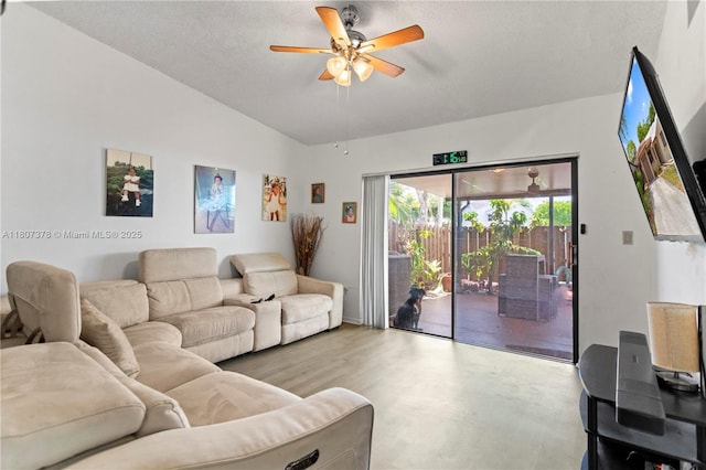 17320 NW 66th Pl, Hialeah, FL 33015 - living room featuring ceiling fan, vaulted ceiling, and a textured ceiling