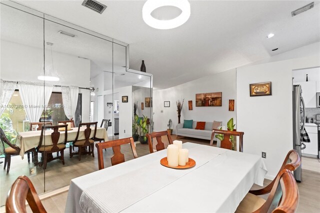 17320 NW 66th Pl, Hialeah, FL 33015 - dining area featuring light wood finished floors