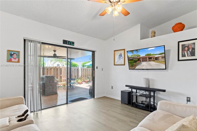 17320 NW 66th Pl, Hialeah, FL 33015 - living room with a ceiling fan, vaulted ceiling, and baseboards