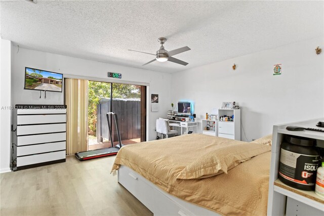 17320 NW 66th Pl, Hialeah, FL 33015 - bedroom with wood finished floors, access to outside, a textured ceiling, and ceiling fan