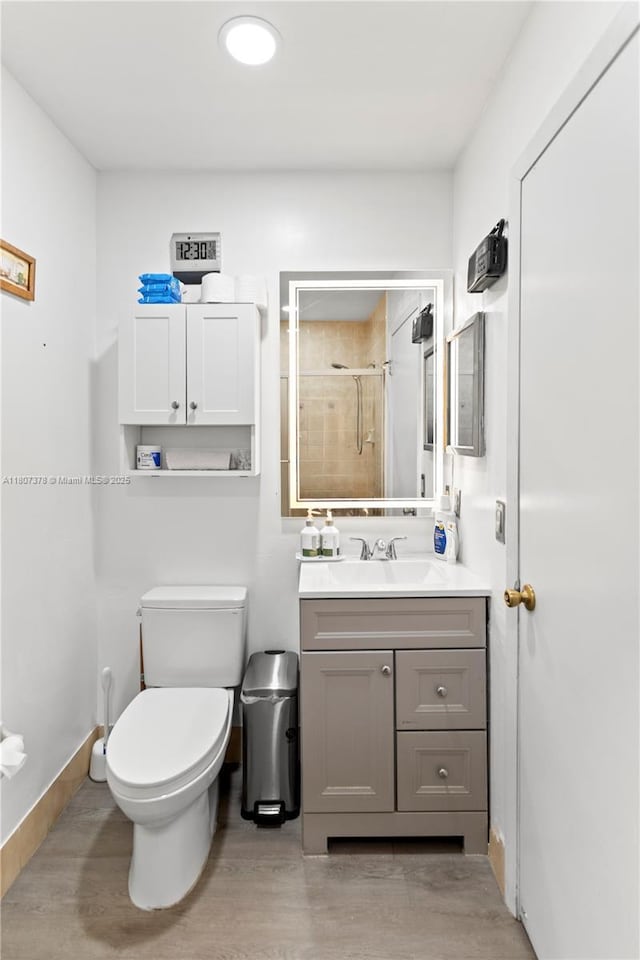 17320 NW 66th Pl, Hialeah, FL 33015 - bathroom featuring a stall shower, toilet, and vanity