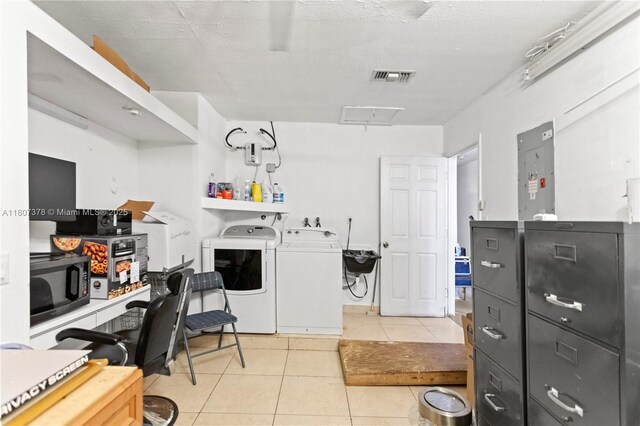 17320 NW 66th Pl, Hialeah, FL 33015 - home office featuring independent washer and dryer, light tile patterned floors, electric panel, and a sink