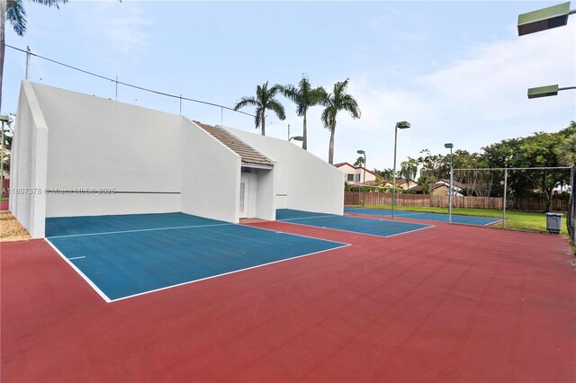 17320 NW 66th Pl, Hialeah, FL 33015 - view of tennis court featuring community basketball court