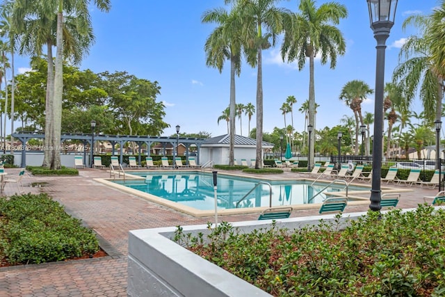 17320 NW 66th Pl, Hialeah, FL 33015 - community pool featuring a patio