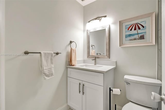 2929 SE Ocean Blvd Unit 123-2, Stuart, FL 34996 - bathroom featuring vanity, toilet, and baseboards