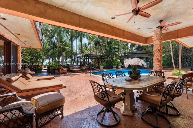 5725 N Bayshore Dr, Miami, FL 33137 - view of patio with outdoor dining area, an outdoor pool, and ceiling fan