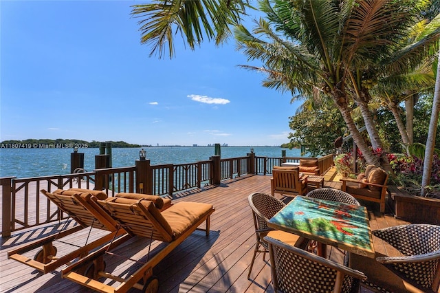 5725 N Bayshore Dr, Miami, FL 33137 - deck with a water view and an outdoor hangout area