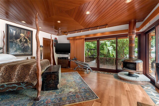 5725 N Bayshore Dr, Miami, FL 33137 - bedroom with wood ceiling, multiple windows, access to exterior, and recessed lighting