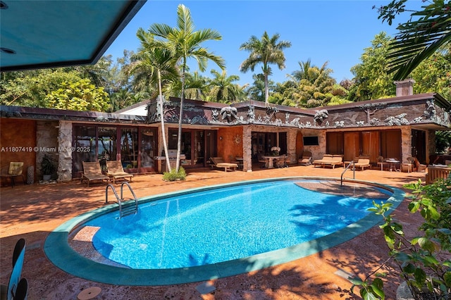 5725 N Bayshore Dr, Miami, FL 33137 - swimming pool featuring a patio
