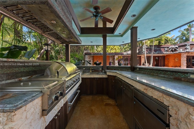 5725 N Bayshore Dr, Miami, FL 33137 - view of patio with a ceiling fan and exterior kitchen
