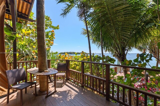 5725 N Bayshore Dr, Miami, FL 33137 - deck with outdoor dining area
