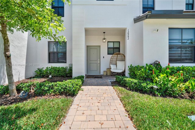 12982 SW 232nd Ln, Miami, FL 33170 - view of exterior entry featuring stucco siding