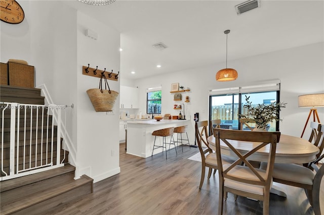 12982 SW 232nd Ln, Miami, FL 33170 - dining space with stairs, wood finished floors, recessed lighting, and baseboards