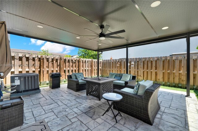 12982 SW 232nd Ln, Miami, FL 33170 - fenced backyard featuring outdoor lounge area, central air condition unit, a patio, and ceiling fan