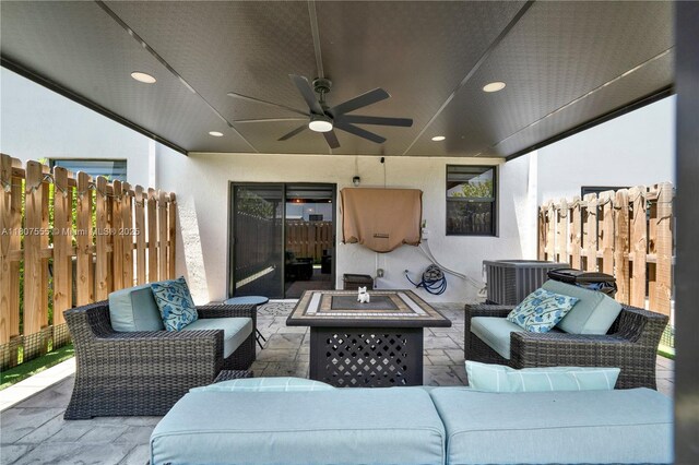 12982 SW 232nd Ln, Miami, FL 33170 - view of patio / terrace with an outdoor living space with a fire pit and ceiling fan