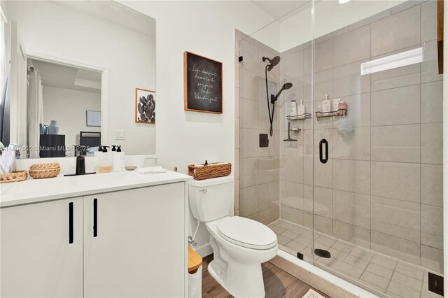 12982 SW 232nd Ln, Miami, FL 33170 - bathroom with a shower stall, toilet, wood finished floors, and vanity