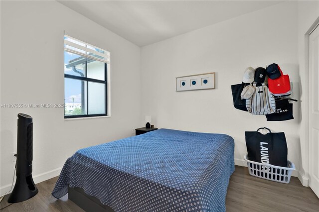 12982 SW 232nd Ln, Miami, FL 33170 - bedroom featuring wood finished floors and baseboards