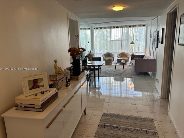 900 Bay Dr Unit 211, Miami Beach, FL 33141 - corridor featuring light tile patterned floors