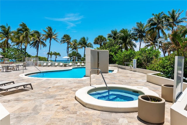 8925 Collins Ave Unit 4A, Surfside, FL 33154 - community pool with a community hot tub and a patio