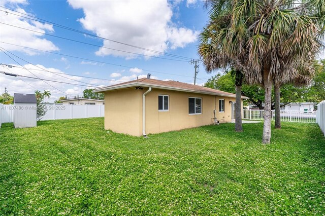 1402 E River Dr, Margate, FL 33063 - view of side of home featuring stucco siding