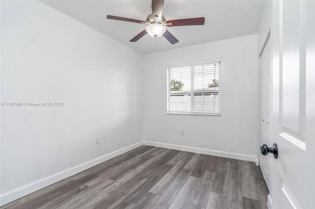 1402 E River Dr, Margate, FL 33063 - spare room with wood finished floors, a ceiling fan, and baseboards