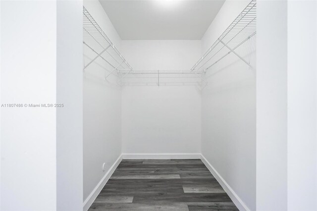 1402 E River Dr, Margate, FL 33063 - spacious closet featuring wood finished floors