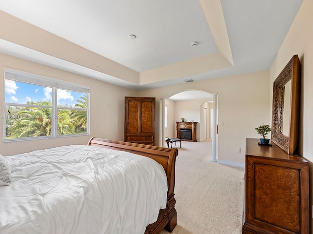 19165 N Gardenia Ave, Weston, FL 33332 - bedroom with arched walkways, carpet, decorative columns, a raised ceiling, and baseboards