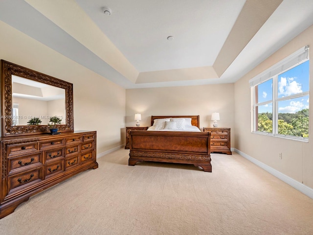 19165 N Gardenia Ave, Weston, FL 33332 - bedroom with baseboards, a tray ceiling, and carpet flooring