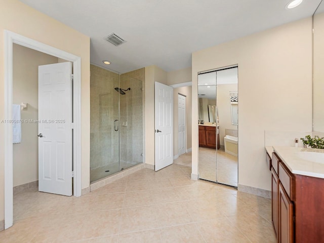 19165 N Gardenia Ave, Weston, FL 33332 - bathroom featuring a shower stall, vanity, tile patterned flooring, baseboards, and recessed lighting