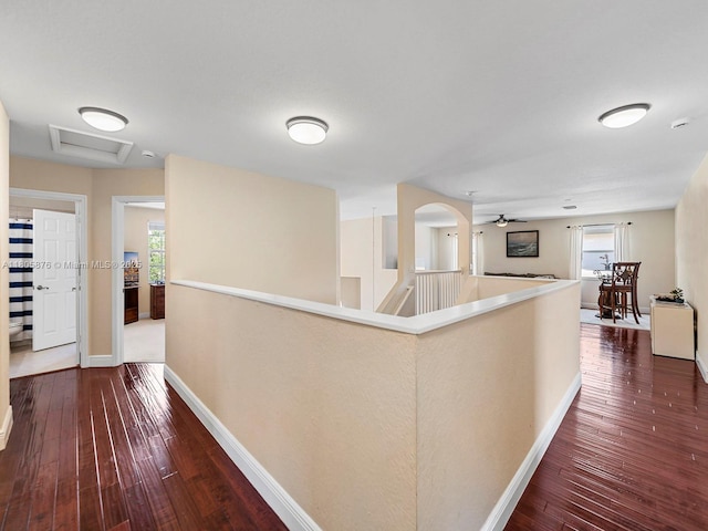 19165 N Gardenia Ave, Weston, FL 33332 - hallway featuring baseboards, wood-type flooring, plenty of natural light, and an upstairs landing