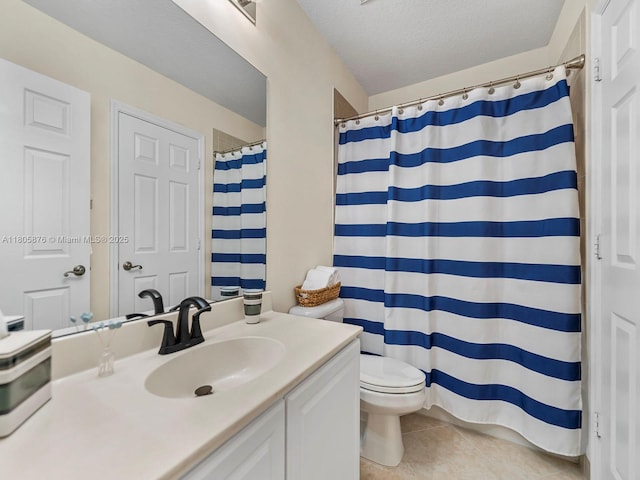 19165 N Gardenia Ave, Weston, FL 33332 - full bath featuring tile patterned flooring, toilet, vanity, a textured ceiling, and a shower with shower curtain
