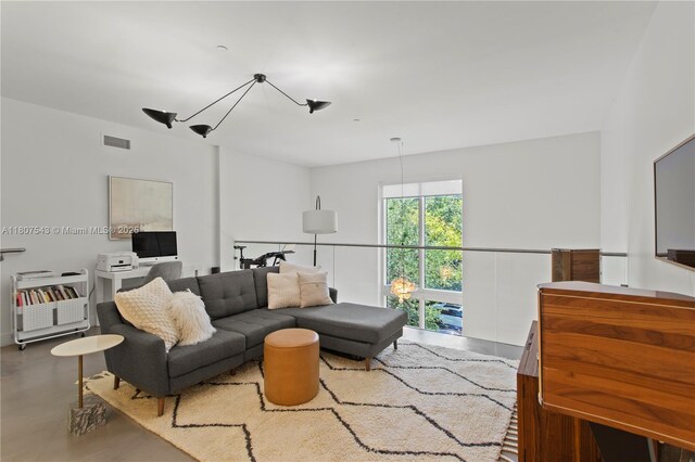 455 NE 39th St Unit 102, Miami, FL 33137 - living area featuring finished concrete floors