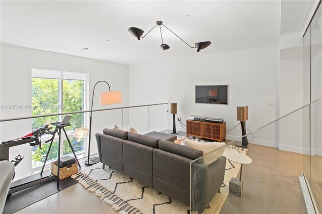 455 NE 39th St Unit 102, Miami, FL 33137 - living area with finished concrete flooring