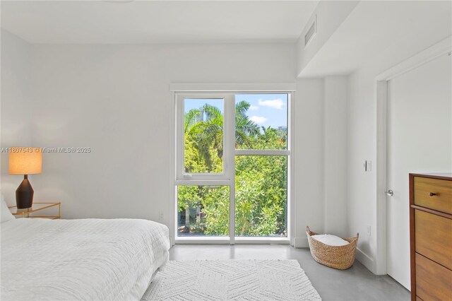 455 NE 39th St Unit 102, Miami, FL 33137 - bedroom with concrete floors