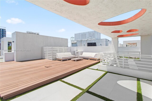 455 NE 39th St Unit 102, Miami, FL 33137 - wooden terrace with outdoor lounge area