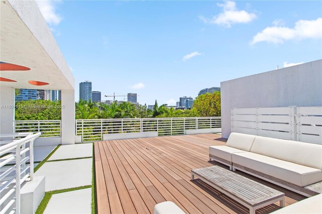 455 NE 39th St Unit 102, Miami, FL 33137 - deck featuring an outdoor living space and a city view