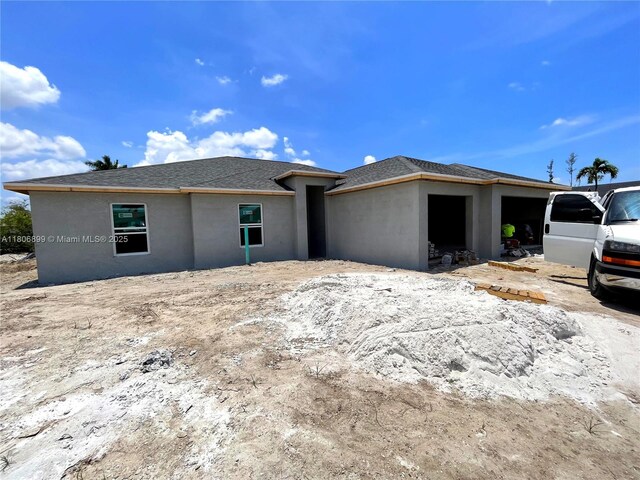 520 SW 28th St, Cape Coral, FL 33914 - view of front of house with stucco siding