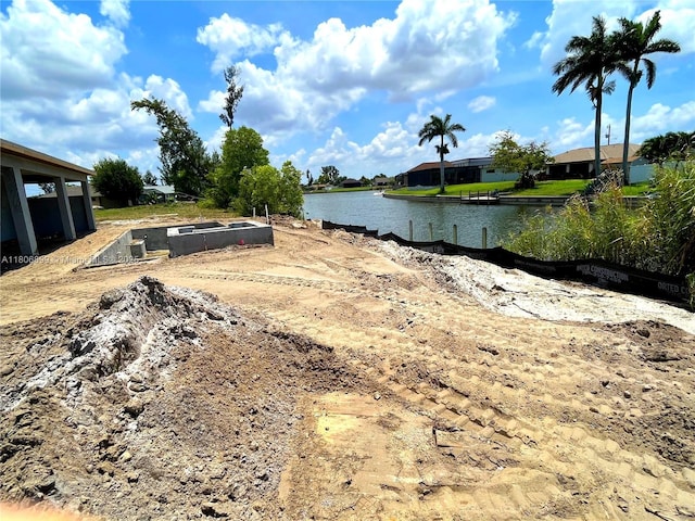 520 SW 28th St, Cape Coral, FL 33914 - view of yard with a water view
