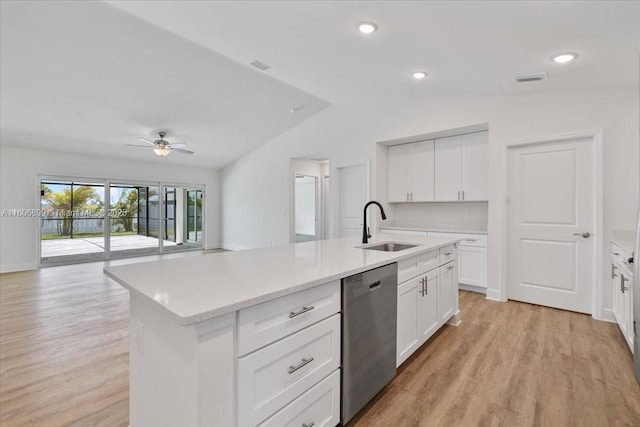 520 SW 28th St, Cape Coral, FL 33914 - kitchen featuring dishwasher, vaulted ceiling, light wood-type flooring, an island with sink, and ceiling fan