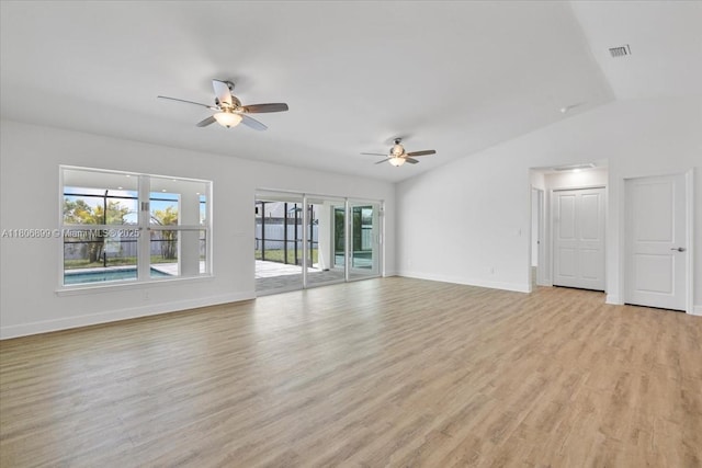 520 SW 28th St, Cape Coral, FL 33914 - unfurnished living room featuring a ceiling fan, light wood-style floors, and lofted ceiling