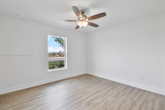 520 SW 28th St, Cape Coral, FL 33914 - unfurnished room with wood finished floors, a smoke detector, and ceiling fan