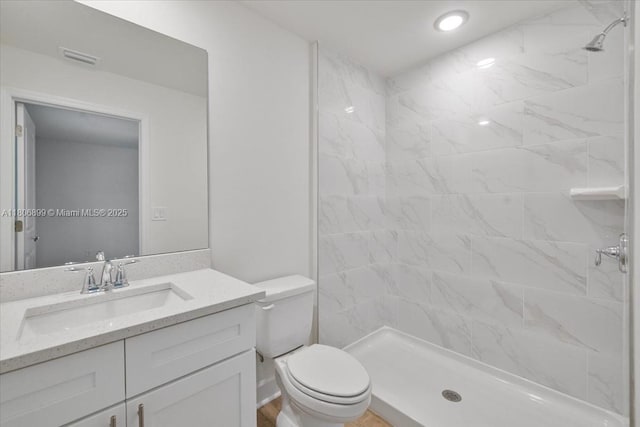 520 SW 28th St, Cape Coral, FL 33914 - bathroom featuring vanity, a stall shower, and recessed lighting
