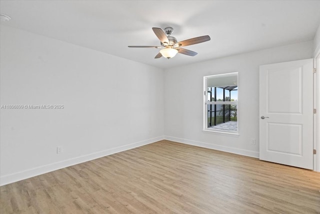 520 SW 28th St, Cape Coral, FL 33914 - empty room featuring light wood finished floors and a ceiling fan