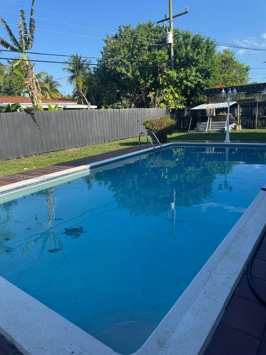 1735 SW 97th Pl, Miami, FL 33165 - view of pool featuring a fenced backyard